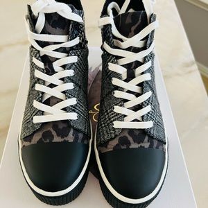 Jessica Simpson high top black and grey sneakers.